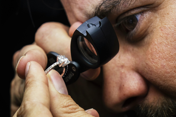 Professional gemstone setting and prong inspection