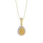 Elegant 10K Yellow Gold Ladies Teardrop Nugget Pendant Featuring A Cluster Of 0.20 Ct Round Diamonds. Includes Chain